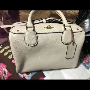 Beige coach bag with long handle